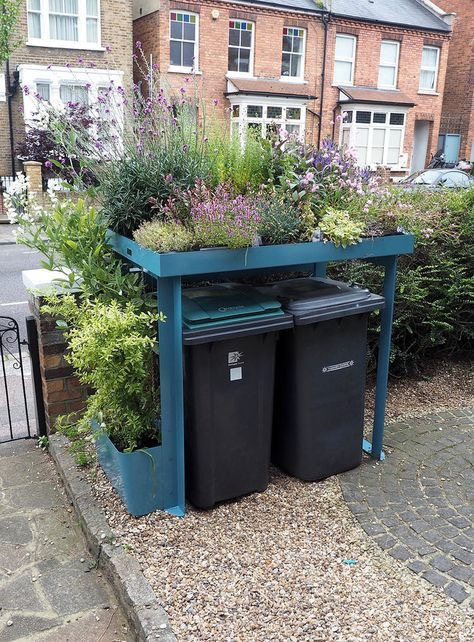 Innovative and pretty wheelie bin storage with flowers. Blog post by Sarah Maidment Interiors, Berkhamsted, Herts
