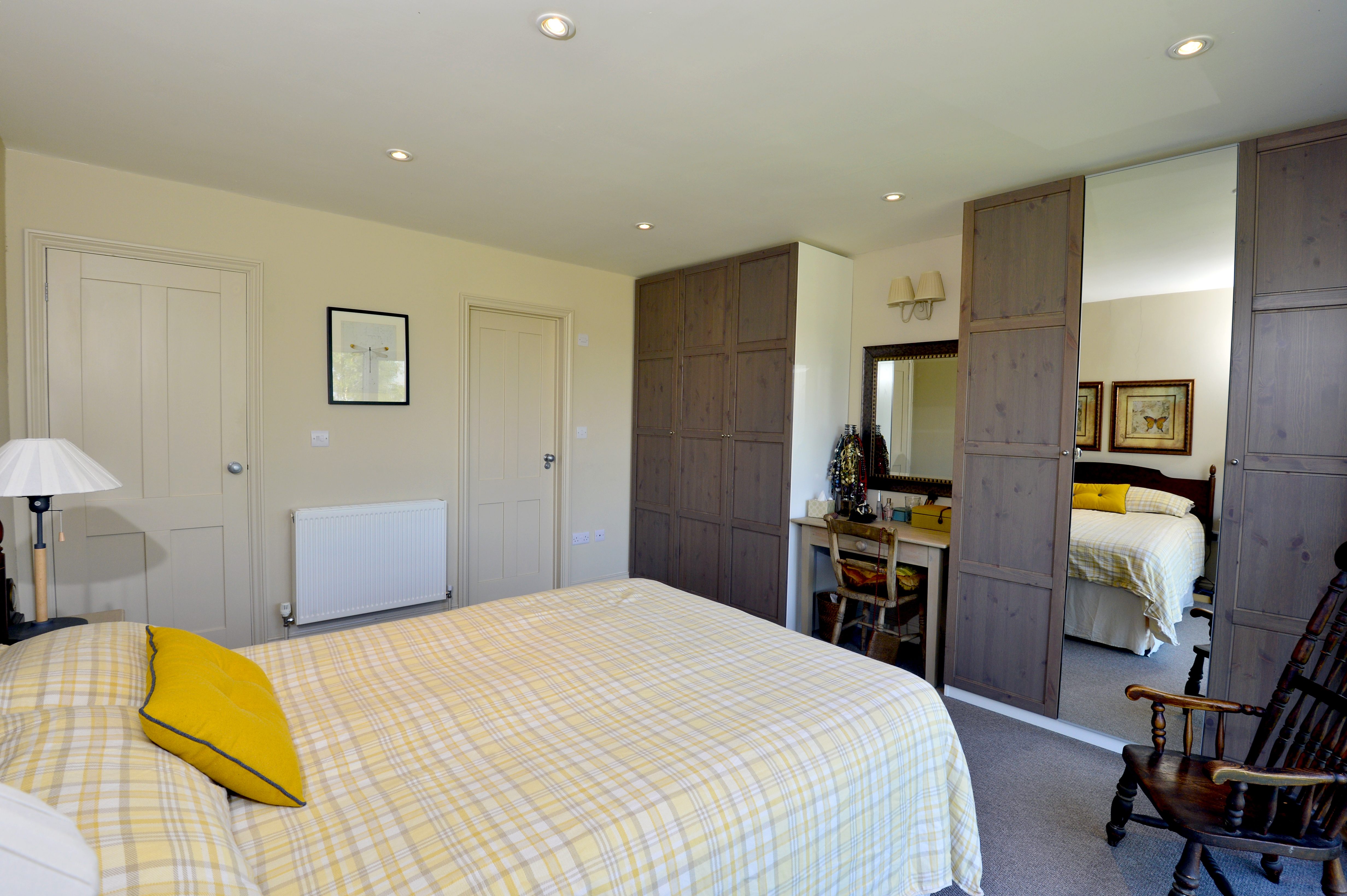 Bedroom Interior Design in in soft yellow colours by Sarah Maidment, interior designer, Brighton, Hove and East Sussex
